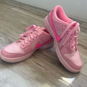 Woman’s pink Nike’s